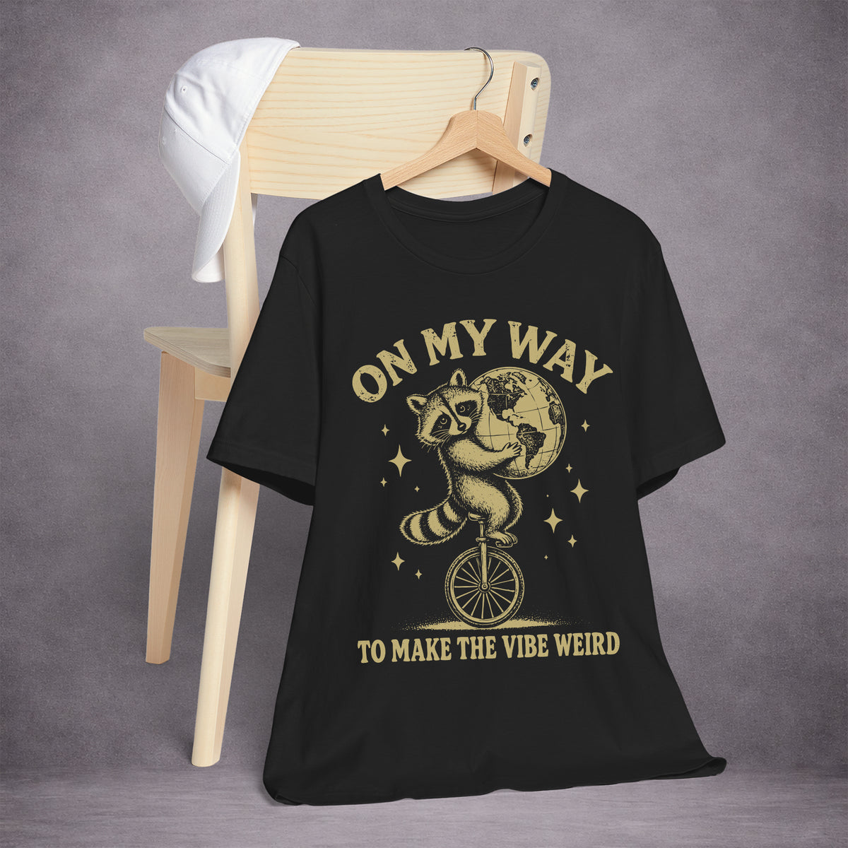 RACCOON-ON-ONE-WHEEL-0C114A-ESSENTIAL-TEE-BLACK-FRONT-INK-GOLD-02