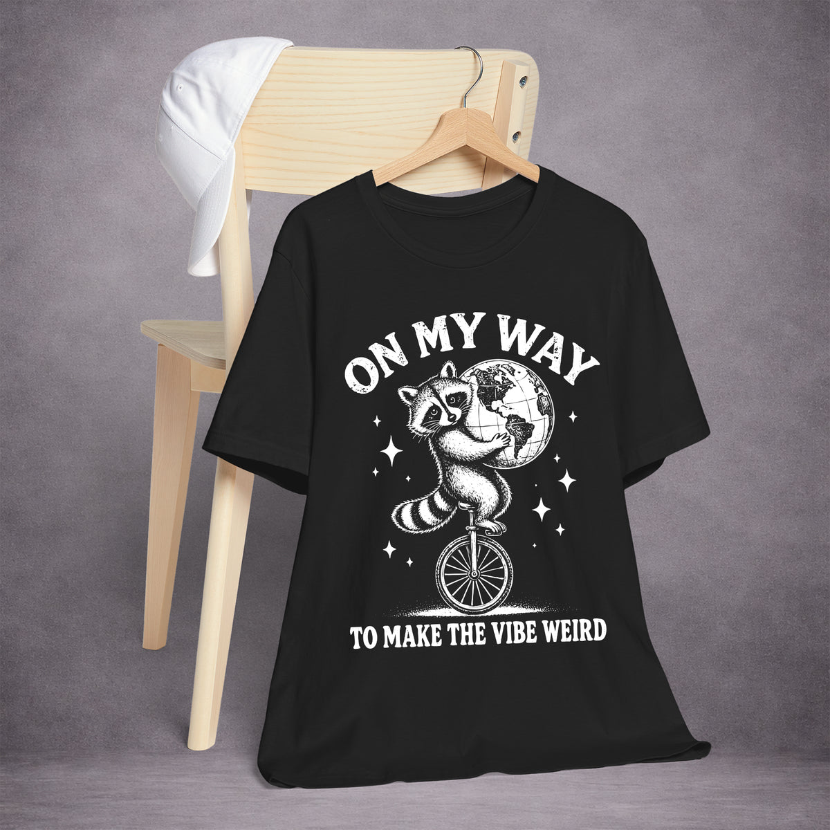 RACCOON-ON-ONE-WHEEL-0C114A-ESSENTIAL-TEE-BLACK-FRONT-INK-WHITE-02