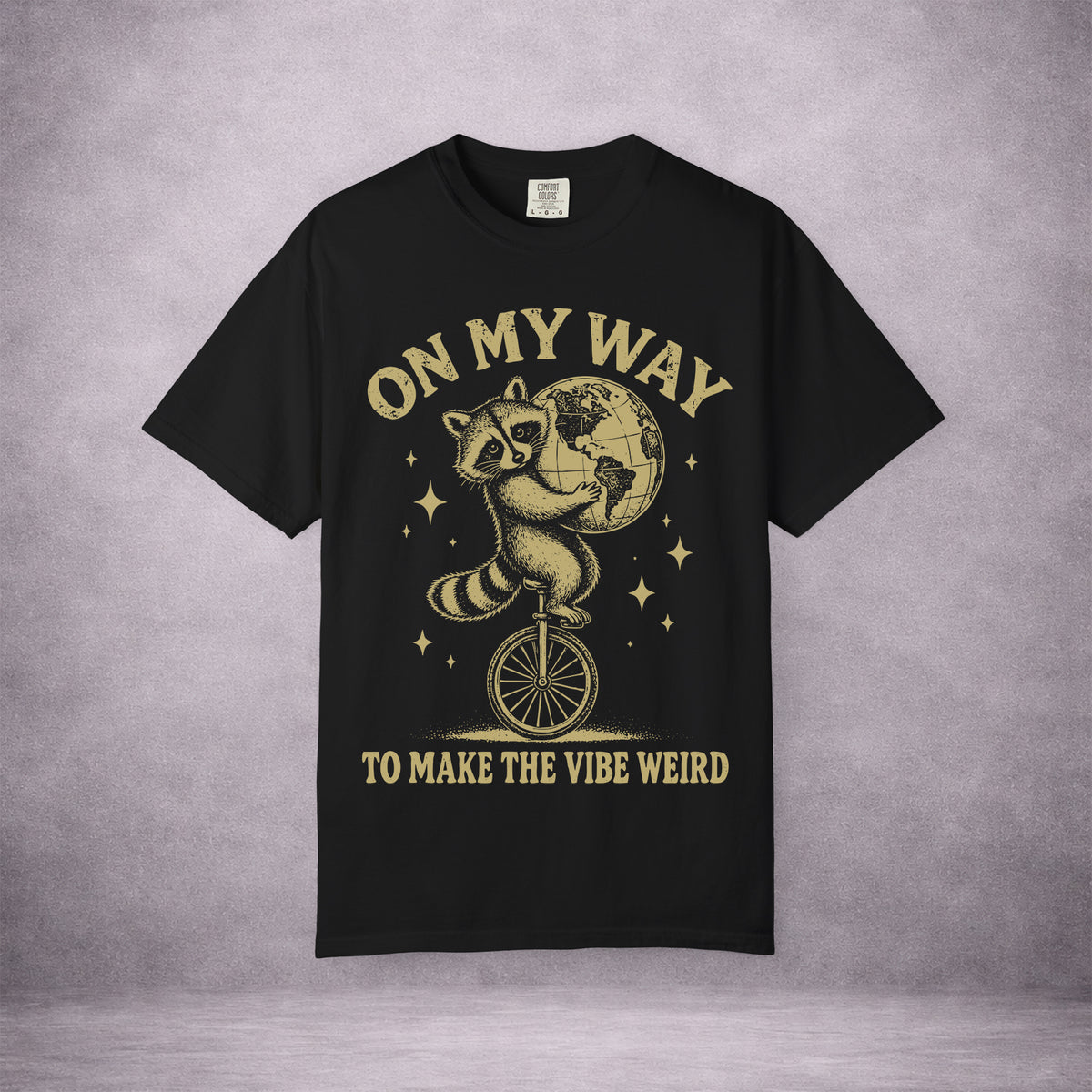 RACCOON-ON-ONE-WHEEL-0C114A-VINTAGE-WASH-TEE-BLACK-FRONT-INK-GOLD-01